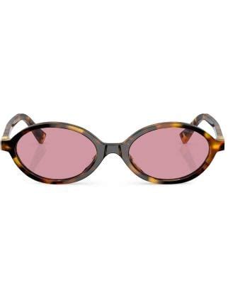 oval sunglasses miu miu|Miu Miu runway sunglasses.